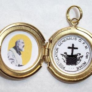 Padre Pio relic locket with free photo holy prayer card