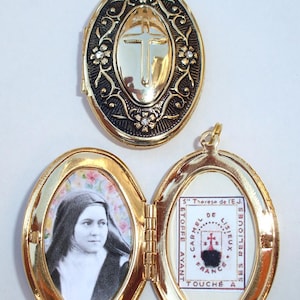 St Therese relic locket with little rhinestones--Large and beautifully detailed