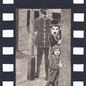 Natuurzandschilderij 24x18 cm Charlie Chaplin Charlot The Kid