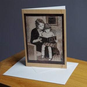 Carte de vœux A5, reproduction du tableau de sable "La mère lisant un livre à sa fille"