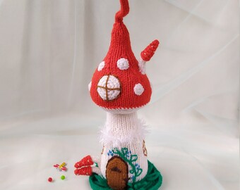 Mushroom house knitted toy made of handmade wool, a gift for a child for a holiday