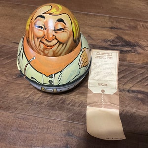 1979 Bristol Ware Cowboy Roly Poly Brownie Tin