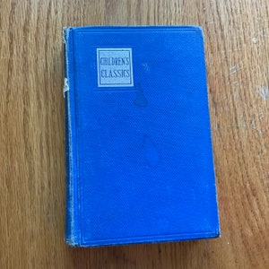 Children’s Classics Alice in Wonderland and Through The Looking Glass by Lewis Carroll
