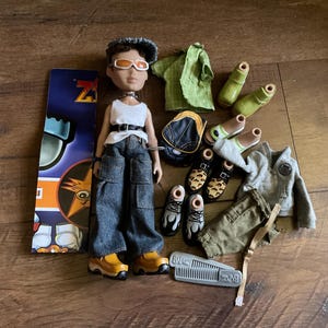 2002 MGA Entertainment Boy Bratz Dylan Doll with Accessories