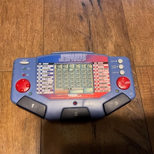 1995 Tiger Electronics Jeopardy Handheld Game - Workds