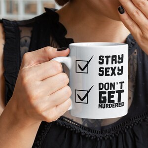 SSDGM My Favorite Murder Mug, Stay Sexy and Don't Get Murdered Coffee Cup for Murderinos, Cute MFM Gifts image 2