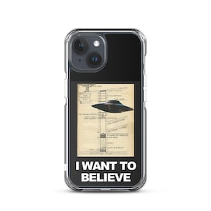May include: A black iPhone case with a clear back. The back of the case features a vintage image of a UFO over a diagram of a structure labeled "The Monkey Pit". The text "I WANT TO BELIEVE" is printed in white below the image.
