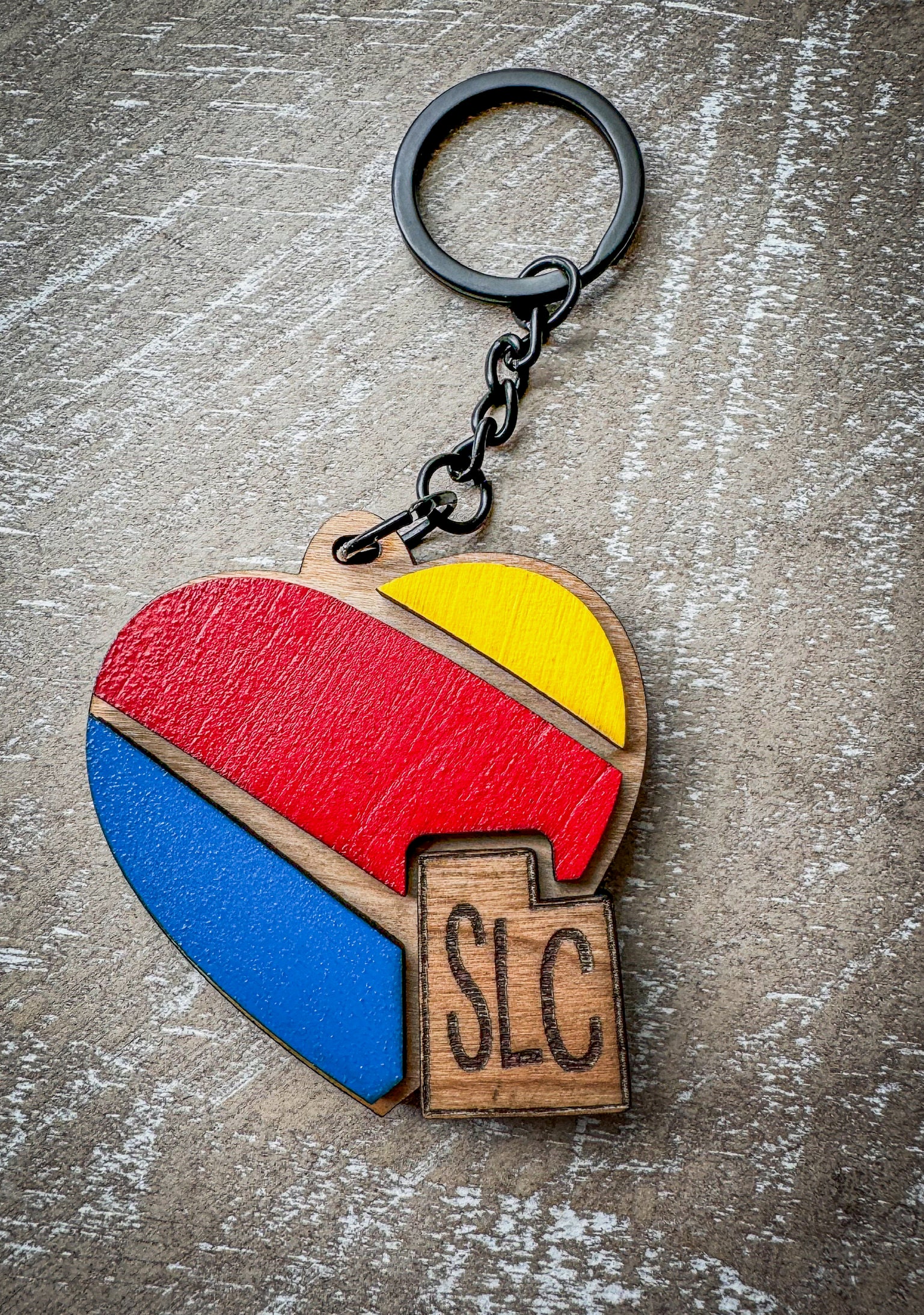 State themed airline inspired keychain for travel lovers