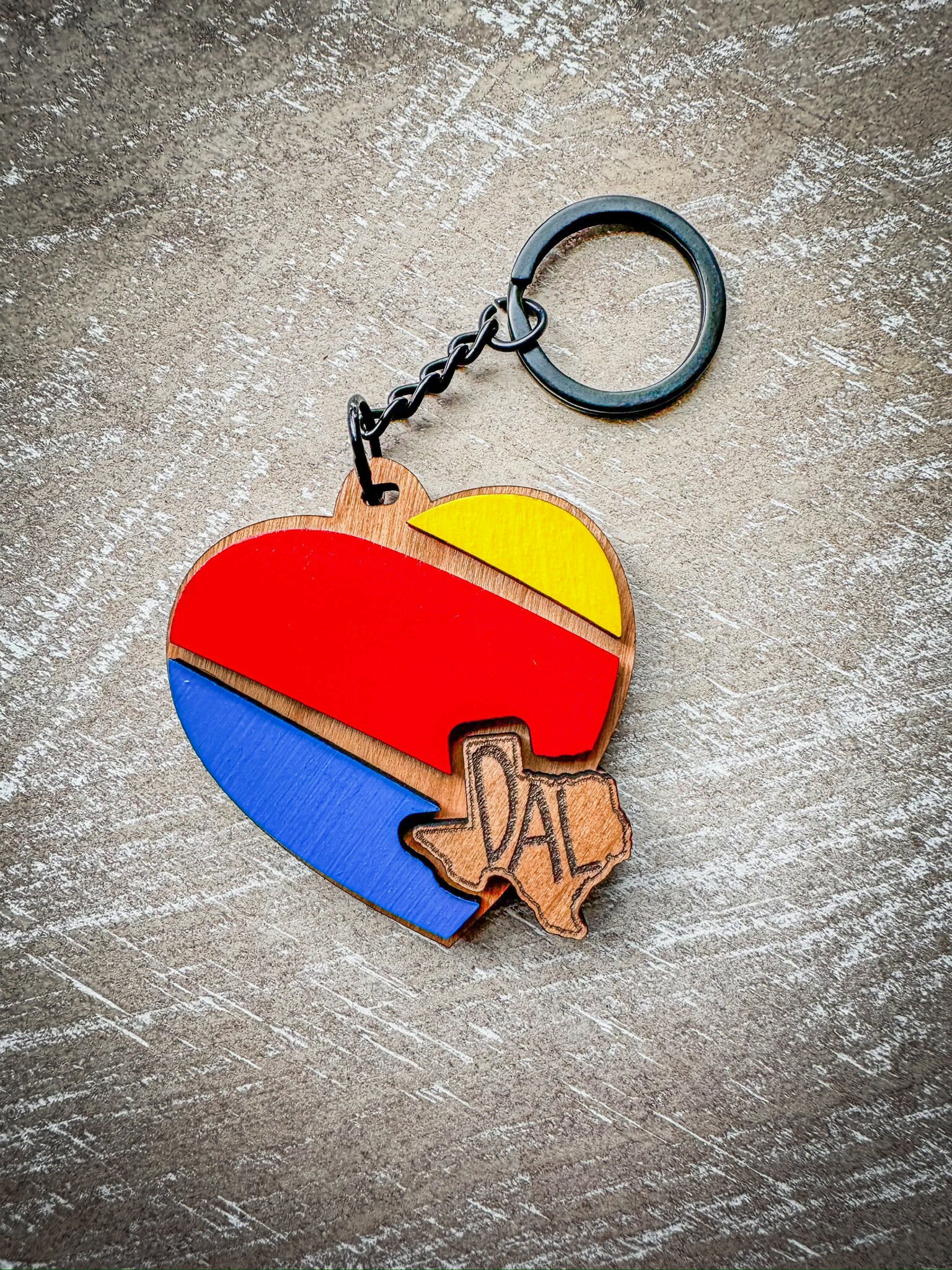 State themed airline inspired keychain for travel lovers