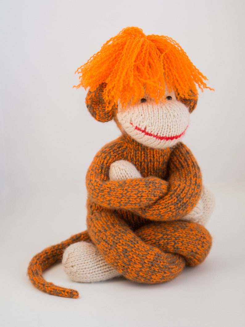 Knitted monkey toy handmade orange wavy hair magnificent 
