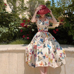 Mr. Water New York Butterfly Midi Dress. V Neck Summer Dress