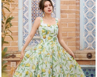 Robe citron New York Mr. Water. Sans manches. Robe de soirée en organza.