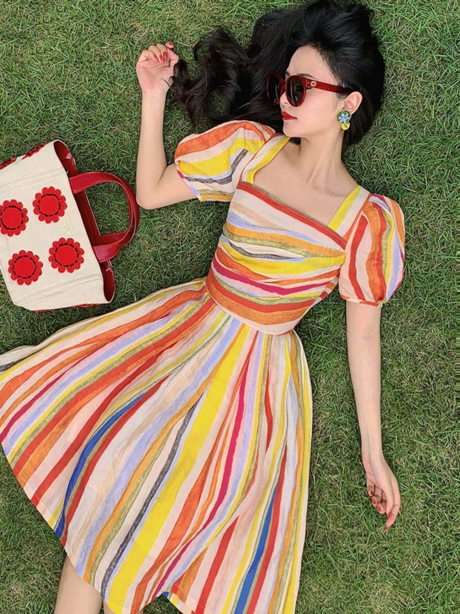 What is Coquette Aesthetic? Everything You Need to Know 14 Mr. Water Rainbow Summer Midi Dress