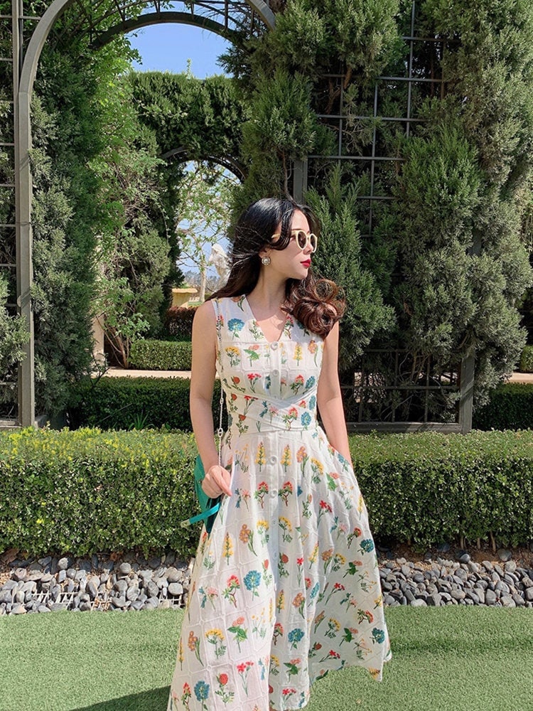 Geborduurde linnen maxi-jurk: mouwloze boho-jurk met bloemenprint en zakken