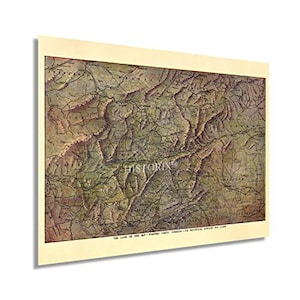 May include: A vintage map of the "Land of the Sky" -  the Western Sheet, showing the mountain ranges and roads.