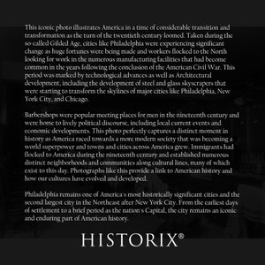 May include: A black and white photograph of a barbershop in the late 1800s or early 1900s. The photo shows a bustling barbershop with men getting haircuts and shaves. The text "HISTORIX&reg;" is at the bottom of the image.