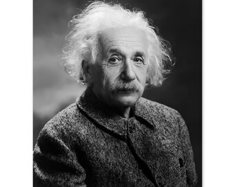 May include: Black and white portrait photograph of Albert Einstein. He is wearing a tweed jacket and has a distinctive white, bushy hairstyle.