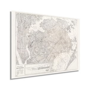 May include: A vintage map of Queens, New York City, printed by Rand McNally. The map shows the borough's streets, parks, and waterways. The map is in black and white with a light brown tint.