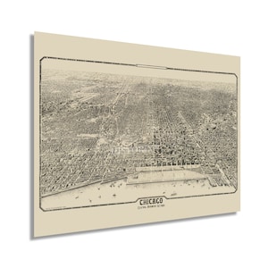 May include: A vintage black and white aerial view map of Chicago's central business district. The map shows the city's streets, buildings, and parks. The text "CHICAGO CENTRAL BUSINESS SECTION" is printed at the bottom of the map.