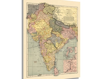 May include: A vintage map of India from 1909, showing the different states and regions of the country. The map is printed in a variety of colors, including green, yellow, pink, and blue. The map is surrounded by a black border and includes a key to the different colors.