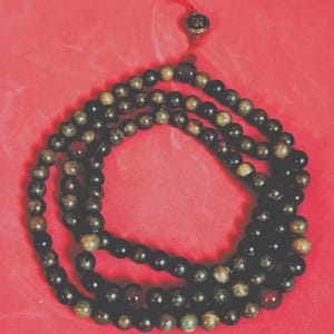 Tibetan traditional prayer beads/ reciting mantras/ meditation/ mindfulness
