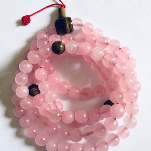 Tibetan Buddhist prayer beads/  Rose quartz/ gemstone/ Heart chakra/ counting mantras/ meditations.