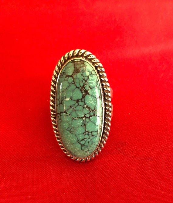 A large and old turquoise and silver ring - image 3