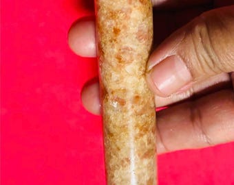 This sandstone chakra   gemstone wand is for healing/ balancing/  chakras/ cystal ball/ clear quartz