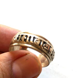 Tibetan mantra spinning silver rings/compassion mantras/
