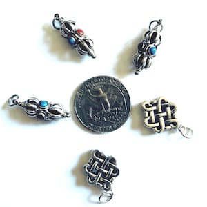 Tibetan Buddhist Vajra and endless knots pendants
