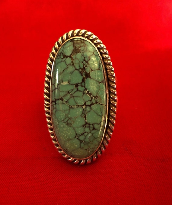 A large and old turquoise and silver ring - image 4