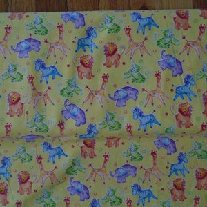 Abstract Safari animals, elephants, lions, zebras, tigers and giraffes on yellow, colorful and fun spring fabric by the yard or piece