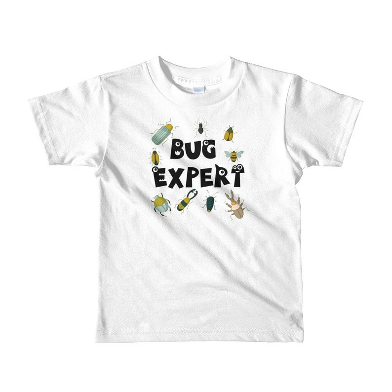 May include: White t-shirt with a black and white graphic of bugs and the text "BUG EXPERT".