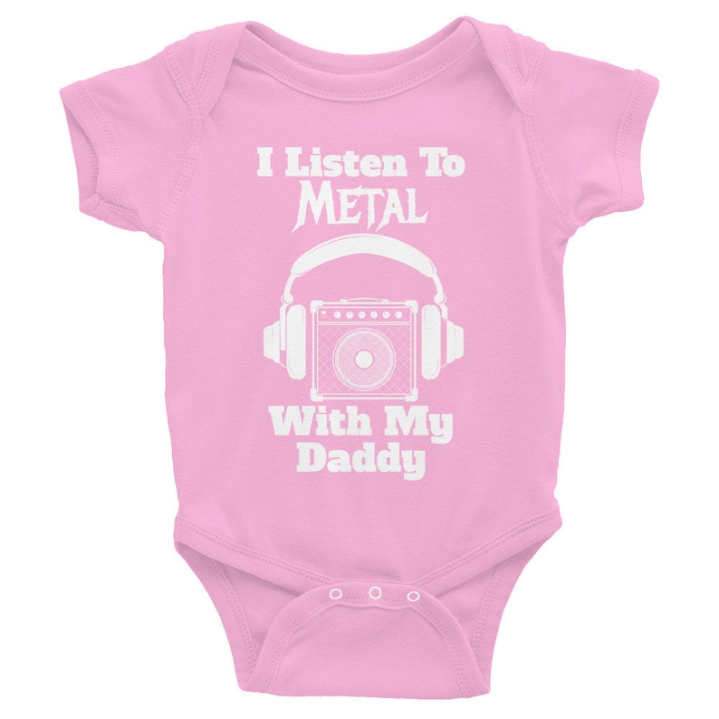 May include: Pink baby onesie with white text that reads "I Listen To METAL With My Daddy" and a graphic of a guitar amplifier with headphones.