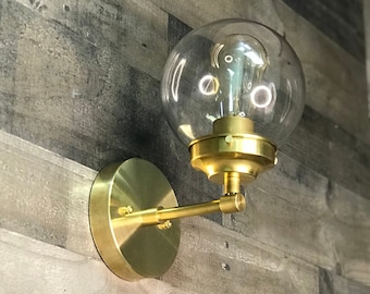 In stock - Ships on the same day! Lucida Single Bulb 6in Globe Vanity Mid Century Industrial Modern Sconce