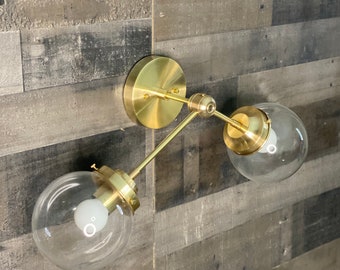 In stock - Ships on the same day! Sakkari Modern Double Light 6in Globe Mid Century Bathroom Sconce