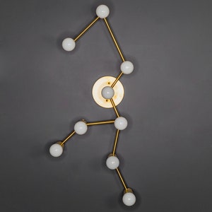 Aquarius 9 Light Zodiac Modern Industrial Vanity Mid Century Bathroom Light Raw Brass