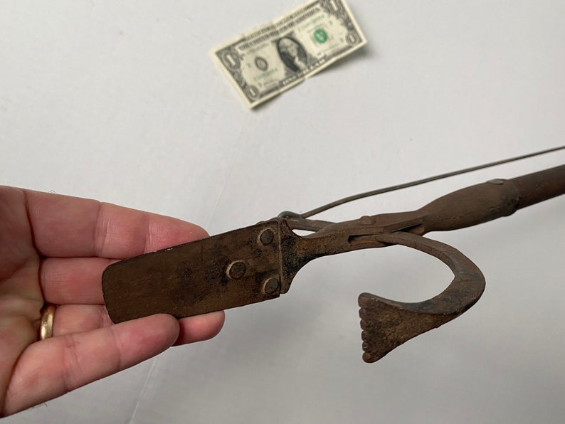 antique dandelion puller