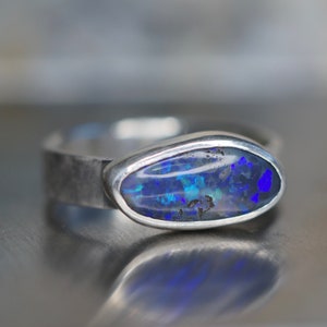 Size 5.75-6. Australian dark blue Boulder opal ring in 925 sterling silver. Gorgeous purple blue teal colors!