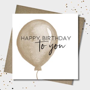 Happy Birthday card & envelope. 12.5cm square card. Gold male or female. Generic card. Gold balloon.