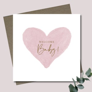 Baby girl card & envelope. 12.5 x 12.5cm square card. New baby. Welcome card. Pink heart. Modern font. Pink and gold