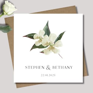 Personalised wedding card & envelope. 12.5cm sq. card. Customised. Bride and Groom. Date. White flower.  Floral.