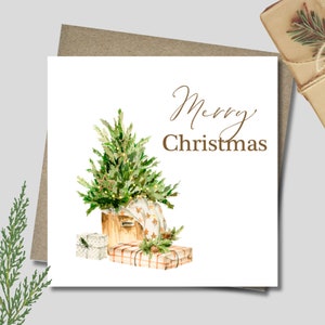 Merry Christmas card and envelope. 12.5cm square. Christmas fir tree and gifts. Watercolour. Brown. Green. Gold.