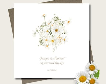 Personalised daisy flower wedding card & envelope. 12.5cm square card. White floral with gold font.