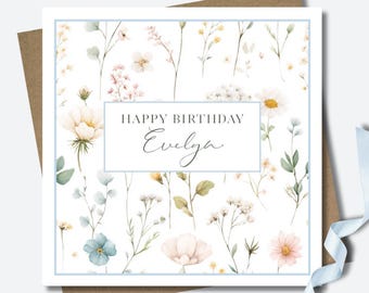 Personalised gift card and envelope. 12.5cm square. Customised pastel floral name birthday card. Wildflowers. Blue. Pink.