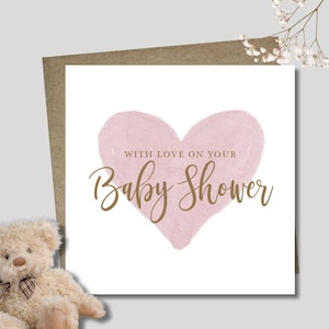 Baby shower card & envelope. 12.5 x 12.5cm card. New baby. Pink blue green heart. Gold font. Welcome baby. Gender neutral. Unisex card.