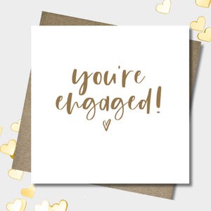 Engagement card & envelope. 12.5cm square card. Gold heart. Handwritten font.Engaged couple.Minimal card.Gold font.