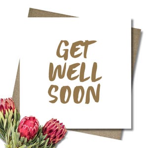 Get well soon card & envelope. 12.5cm square card. Gold handwritten font. Sickness. Hospital. Medical procedure. Operation.