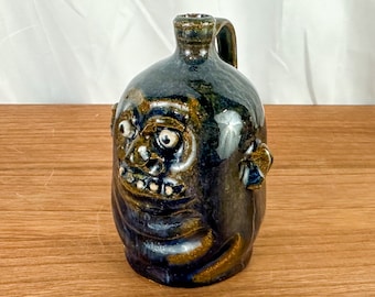 Signed Marvin Bailey "Blue Ugly Face Jug with 5 Teeth"