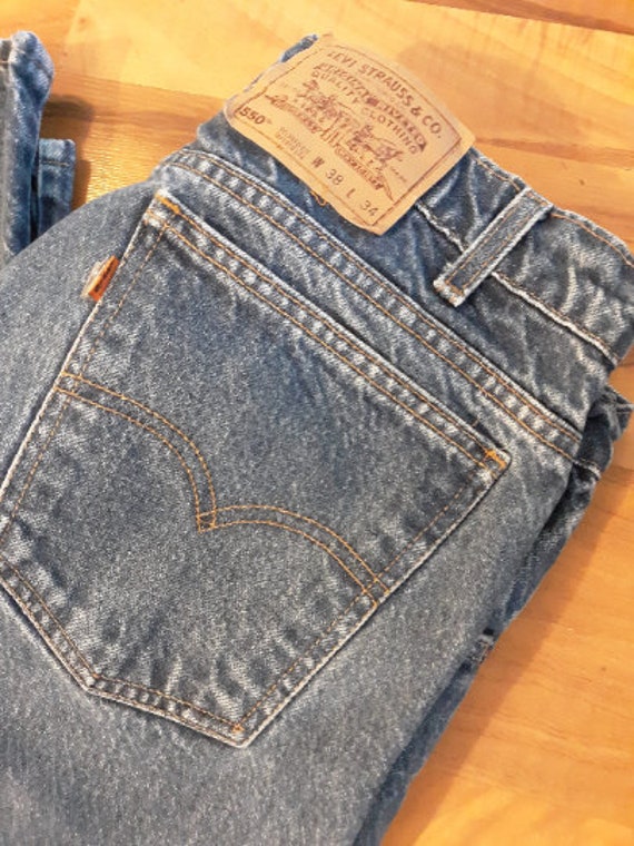 Kleding Gender-neutrale kleding volwassenen Jeans Size 34 Levi’s 550 Orange Tab Vintage Jeans 